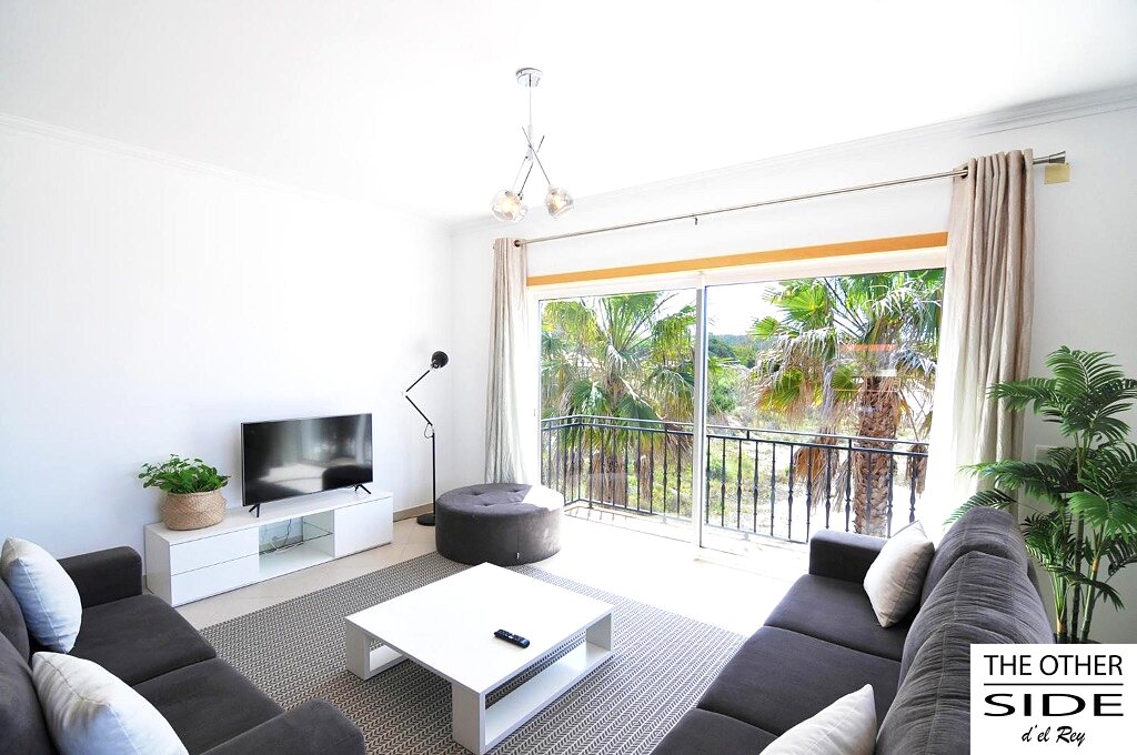 Light-filled living room opening onto the terrace